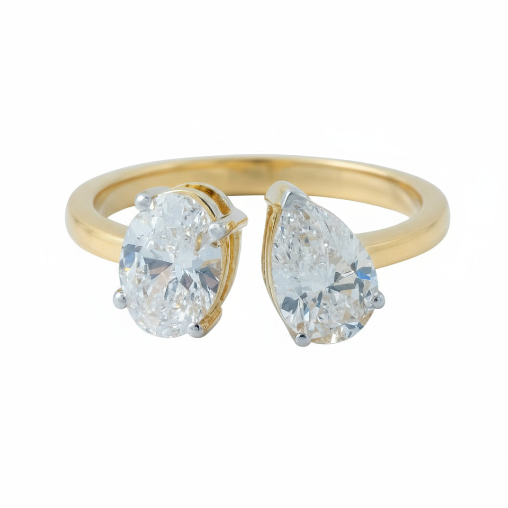 18K Toi et Moi lab-grown diamond engagement ring in gold with pear and round stones — Adira by Love & Diamonds, modern sustainable proposal ring Philippines.