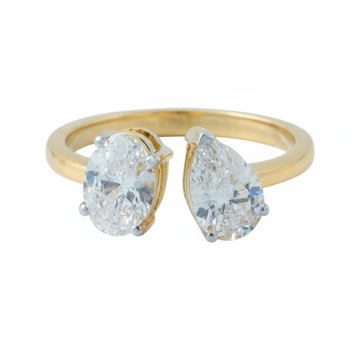 18K Toi et Moi lab-grown diamond engagement ring in gold with pear and round stones — Adira by Love & Diamonds, modern sustainable proposal ring Philippines.