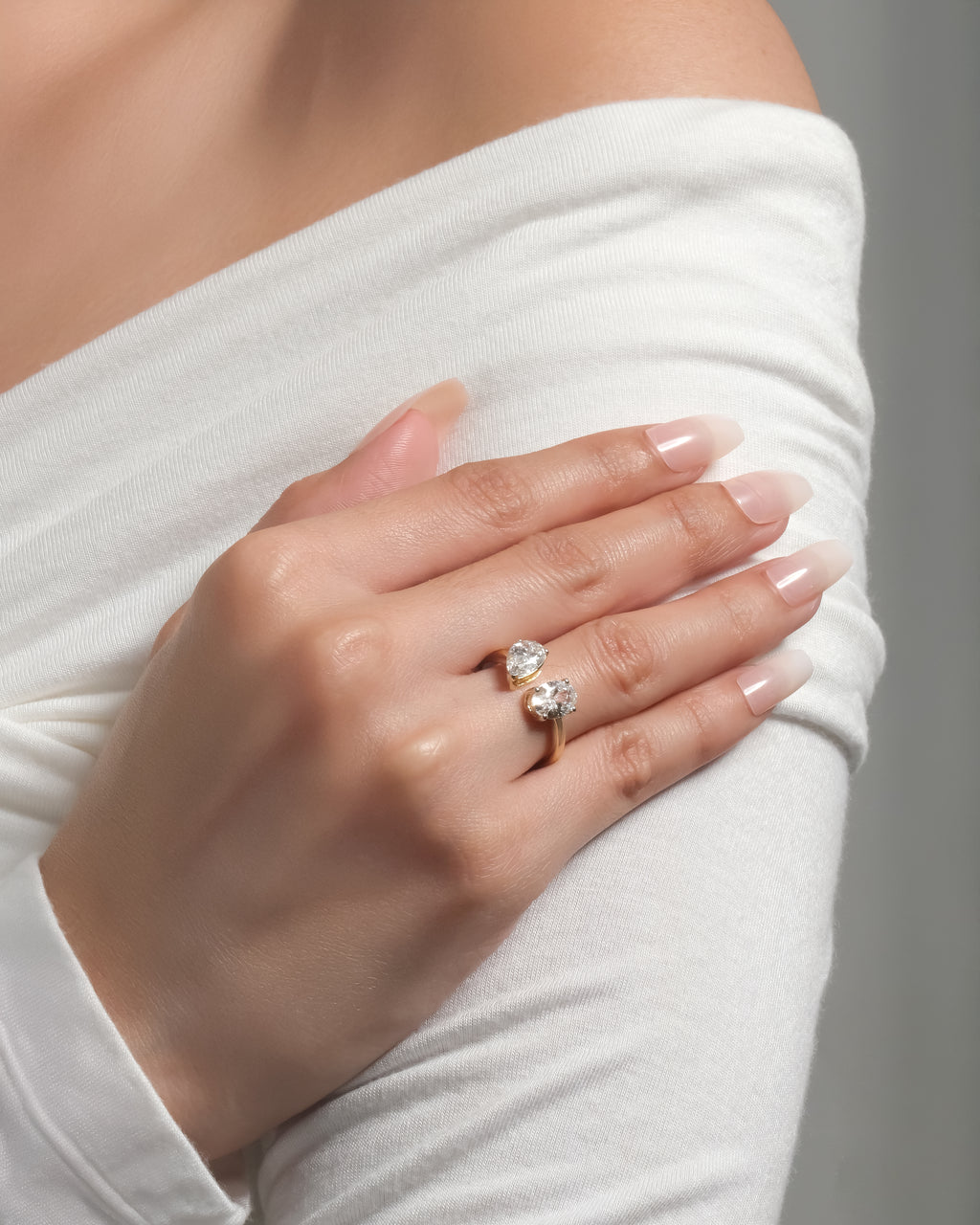 18K Toi et Moi lab-grown diamond engagement ring in gold with pear and oval  stones — Adira by Love & Diamonds, modern sustainable proposal ring Philippines.