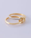 Avari 2-Band multi-wear gold ring featuring a pavé diamond band linked with smooth plain band, available in white and yellow gold.