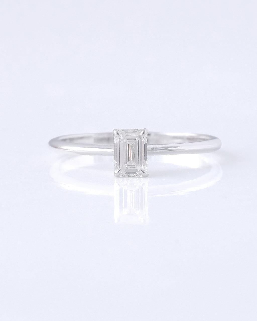 A white gold with an emerald cut lab grown diamonds