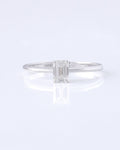A white gold with an emerald cut lab grown diamonds