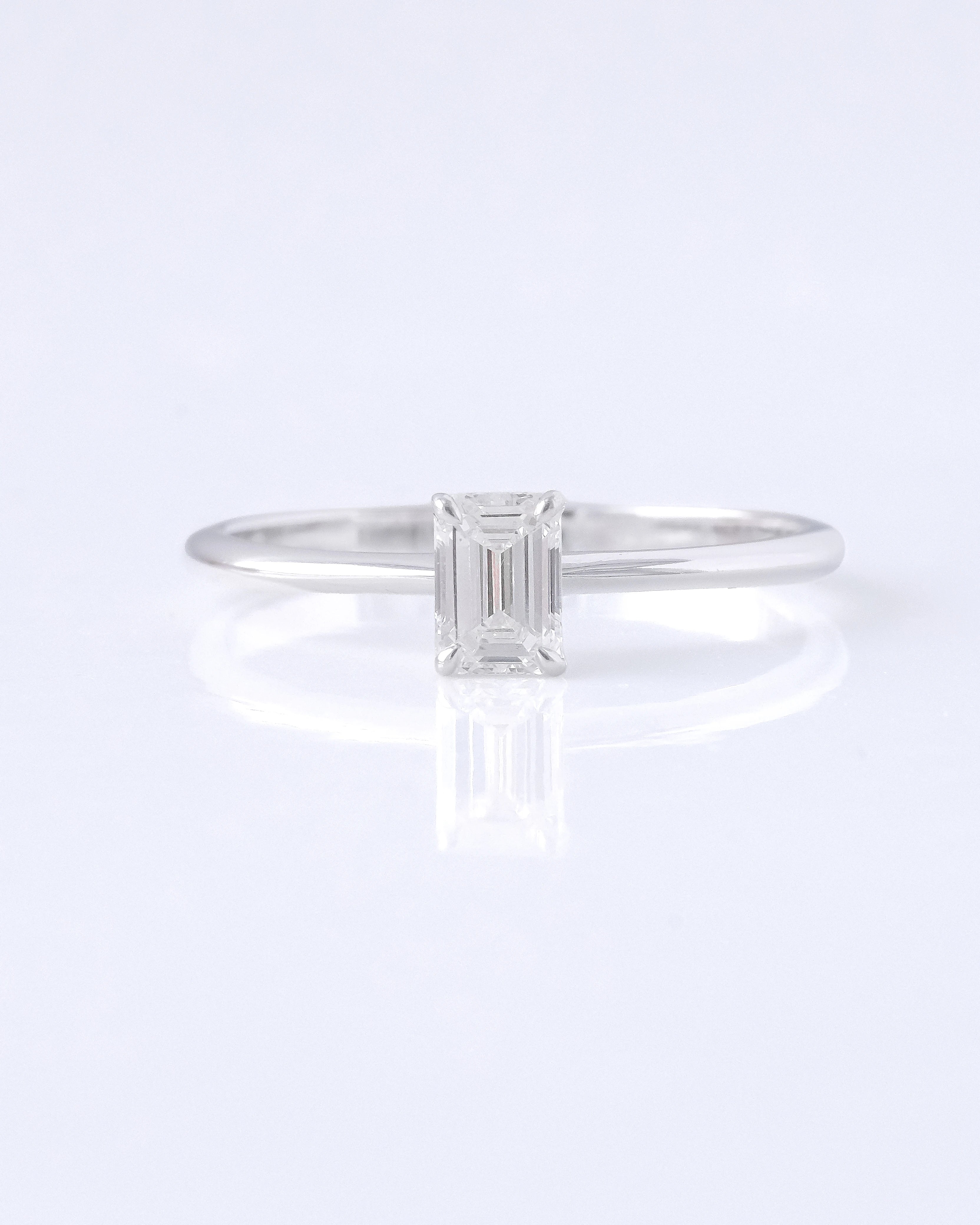 A white gold with an emerald cut lab grown diamonds