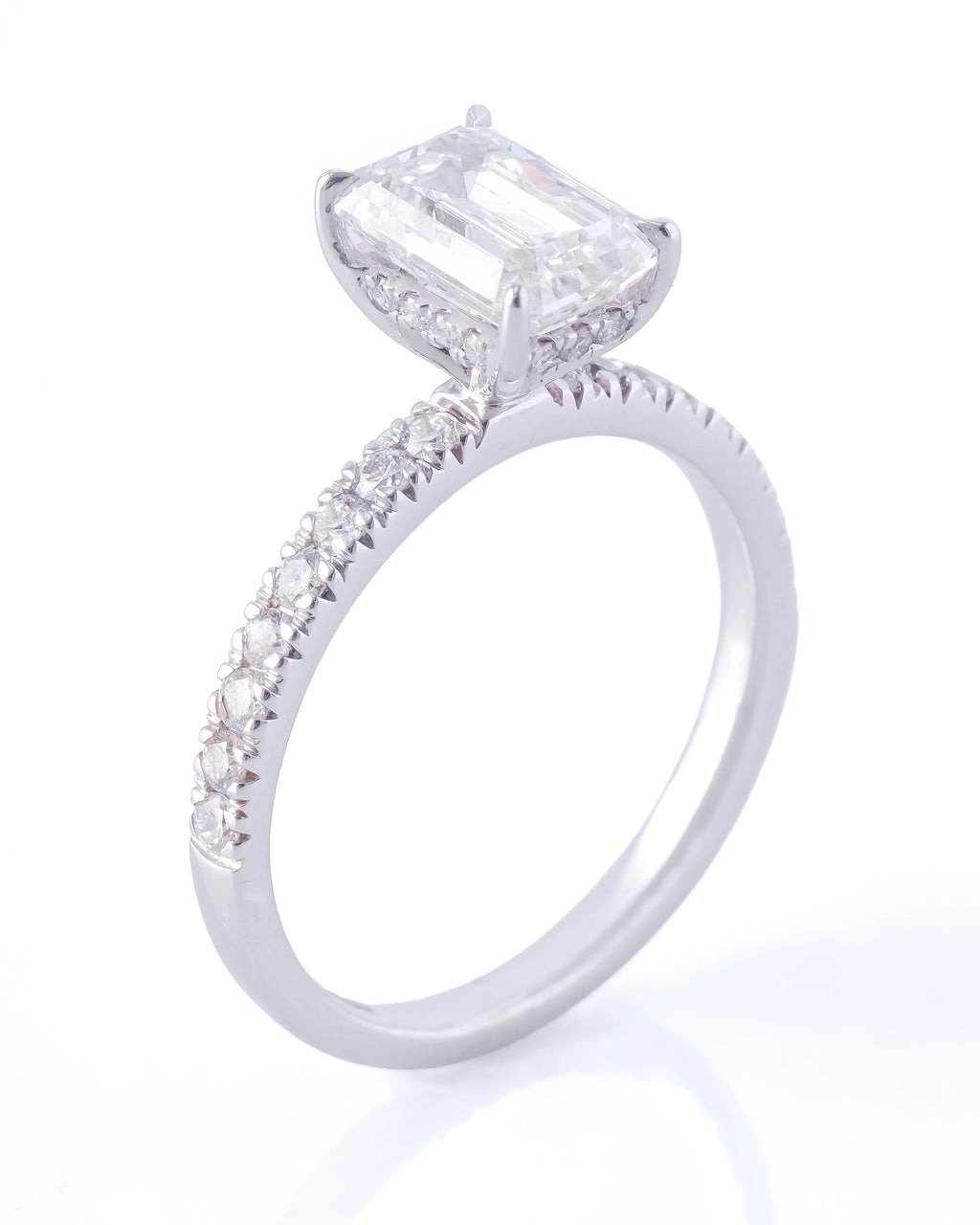 Diamond ring with a prominent gemstone on a white background